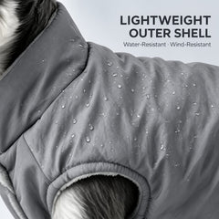 Close-up of water droplets on the lightweight gray outer shell.