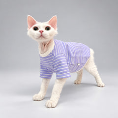 Cat wearing the Lavender Stripe crewneck shirt, standing in side view.