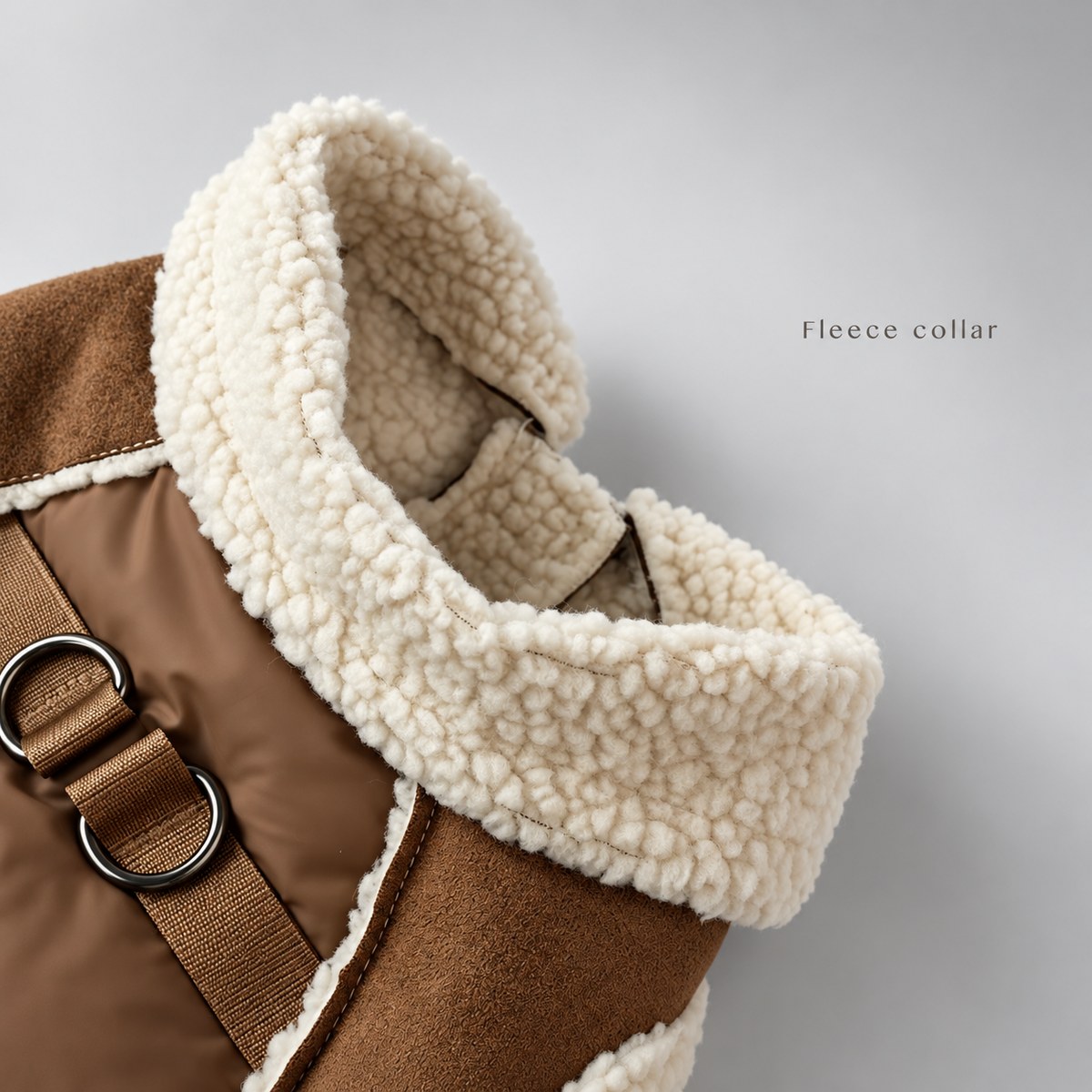 Thick cream sherpa-style collar on the brown quilted winter dog coat.