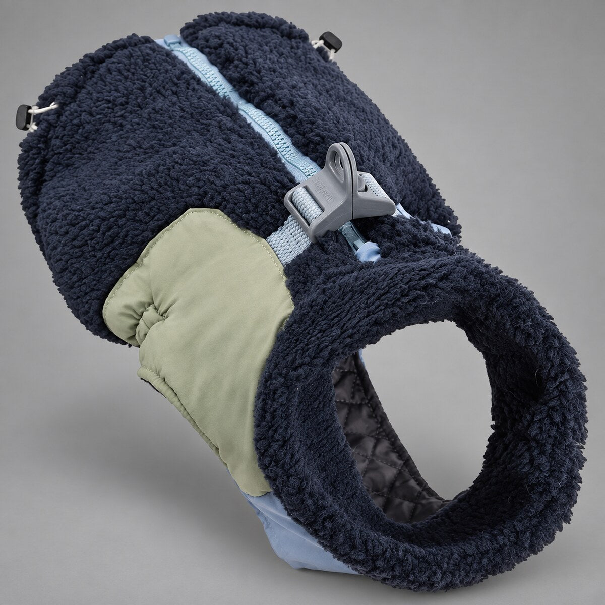 Deep Navy Alpine colorblock sherpa dog jacket showing its high collar and back buckle.