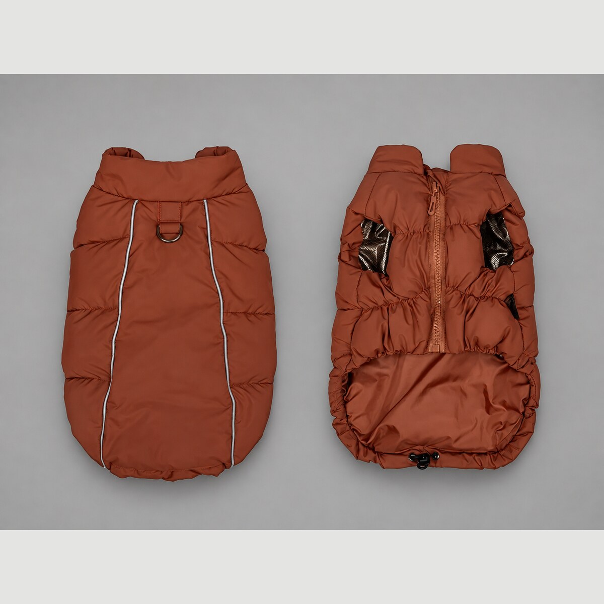 Brick Red winter dog puffer vest shown from the outside and inside, with the back D-ring and adjustable hem.