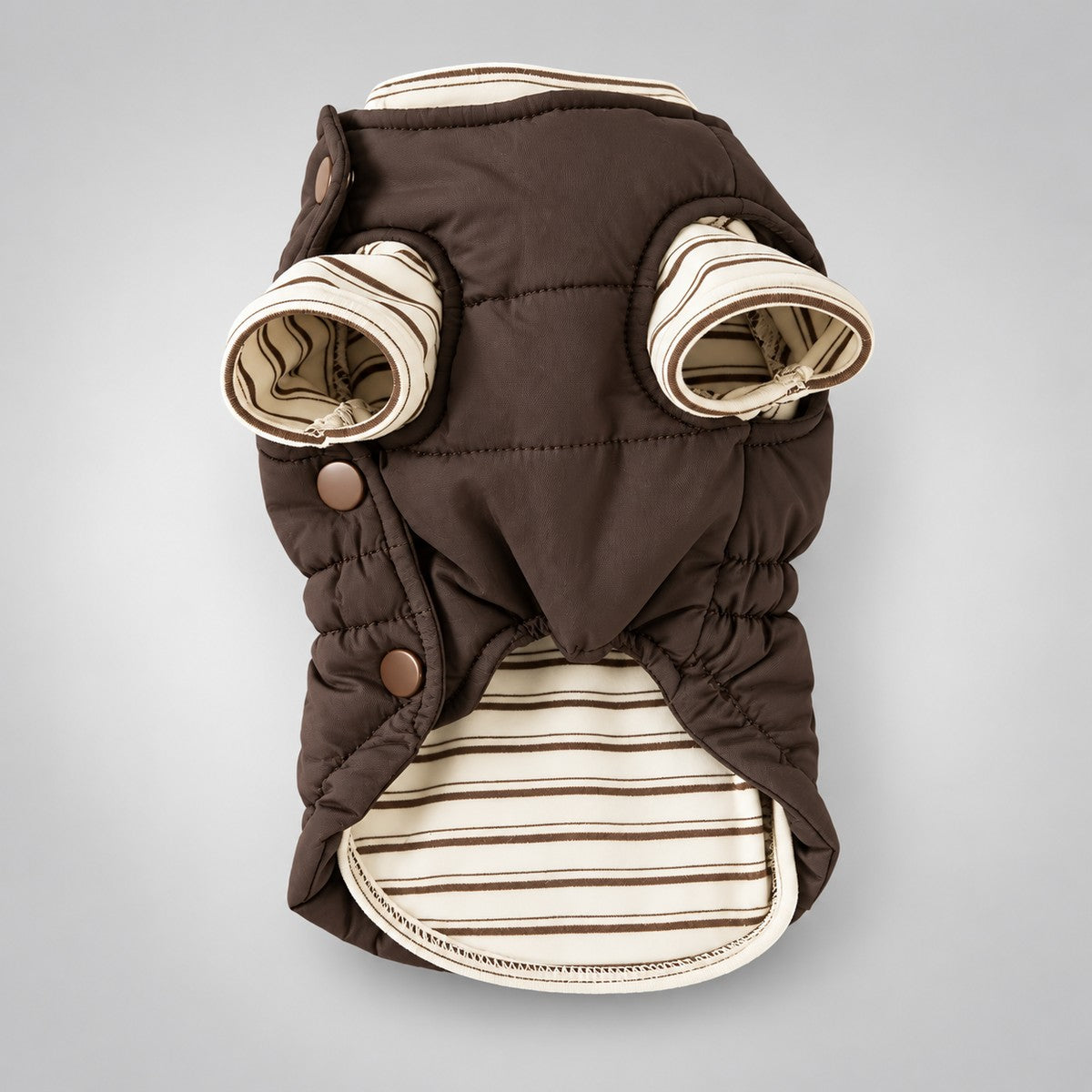 Front panel of the brown padded vest over the cream striped shirt, with sleeveless arm openings and side snaps.