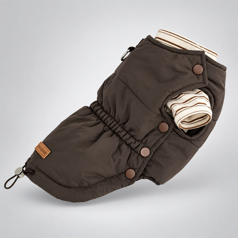 Angled view of the brown padded dog vest layered over a cream striped shirt, with side snaps and a gathered waist.