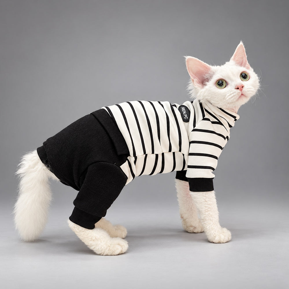 Cat wearing the Classic Stripe onesie, standing in side view.