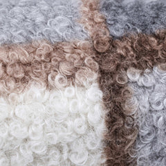 Close-up of the Blue English Country dog coat showing the boucle plaid texture.