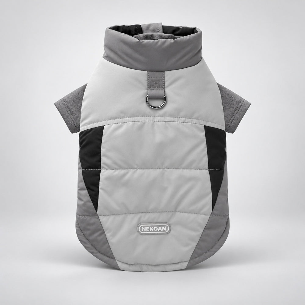 Back view of the layered dog outfit with fleece sleeves visible beneath the vest.
