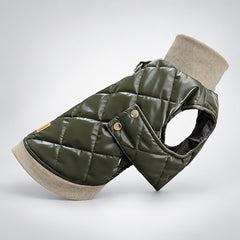 Angled view of the padded olive dog vest with diamond quilting and gold-tone side snaps.